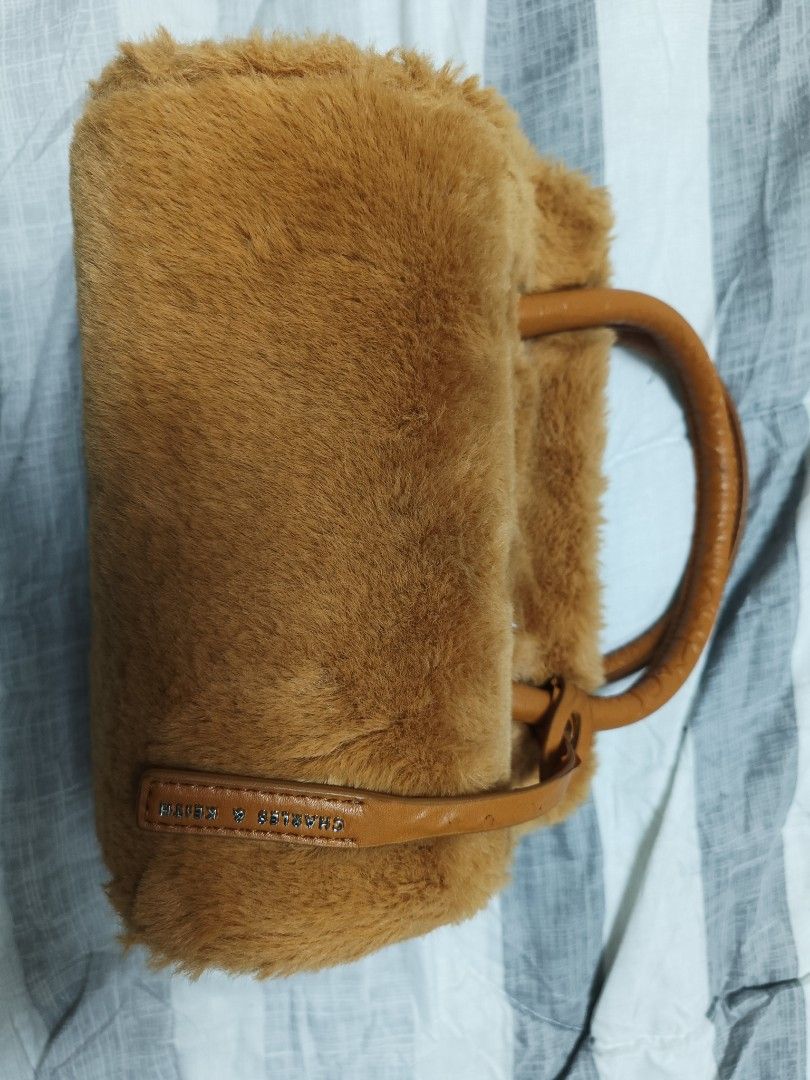 Charles & Keith Sling Bag (Category: Cross-body Bags) located in Imus. Submitted by cmp888 (Listing ID 1402514968, Image 1). Description: decluttering...original from singapore.