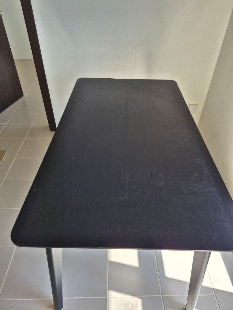 Dark Wood Dining Table, IKEA LISABO (Category: Tables & Sets) located in San Juan City. Submitted by freewind_3eb738 (Listing ID 1402570294, Image 1). Description: - Dark wood rectangular dining table. L 140cms W 75cms H 75cms. - Features four legs and rounded corners. easy to disassemble. - Suitable for small dining areas - Sturdy and well-maintained - Perfect for everyday use or entertaining - Simple, modern design.