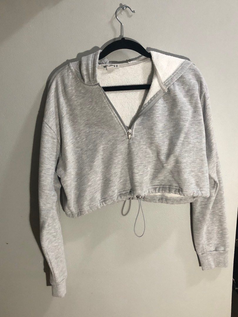 Gray Cropped Hoodie (Category: Coats, Jackets and Outerwear) located in Pasig City. Submitted by ells.preloved (Listing ID 1402611470, Image 1). Description: adjustable on the bottom part .
