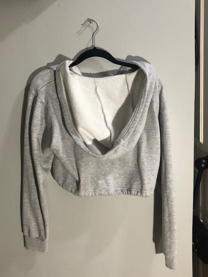 Gray Cropped Hoodie (Category: Coats, Jackets and Outerwear) located in Pasig City. Submitted by ells.preloved (Listing ID 1402611470, Image 2). Description: adjustable on the bottom part .