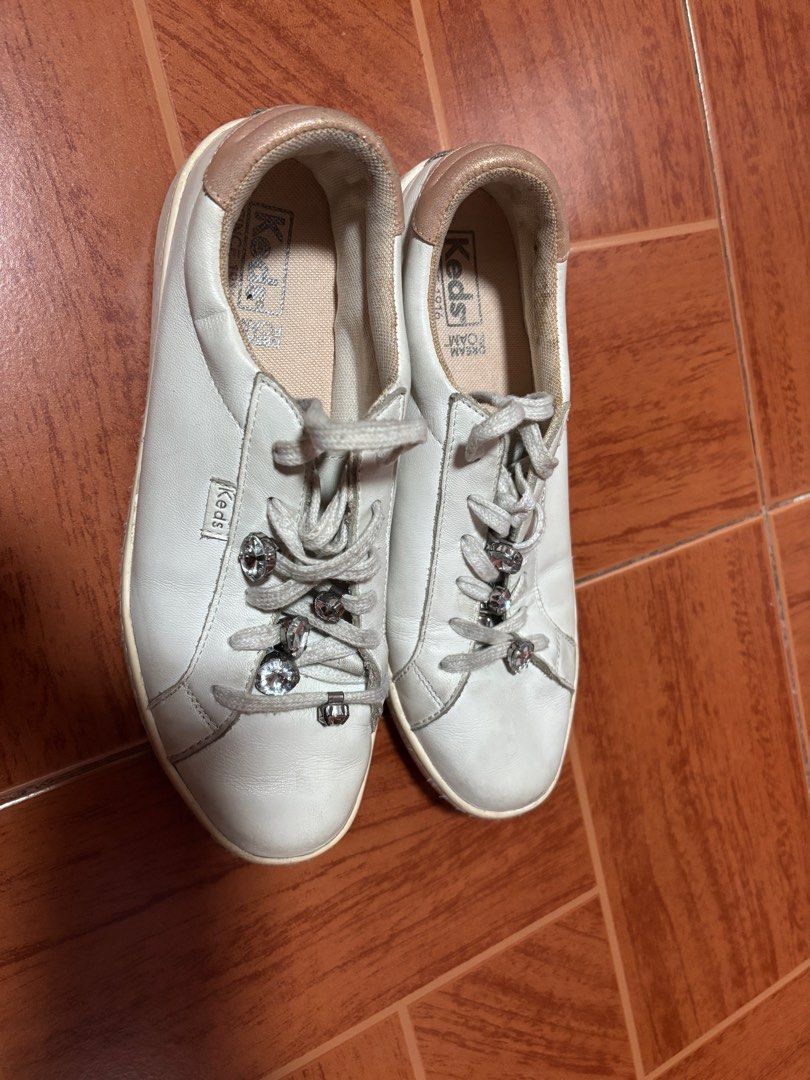 Keds White Sneakers with Embellishments (Category: Sneakers) located in Quezon City. Submitted by rosemelendres02 (Listing ID 1402496416, Image 2). Description: Damages attached in the photos .