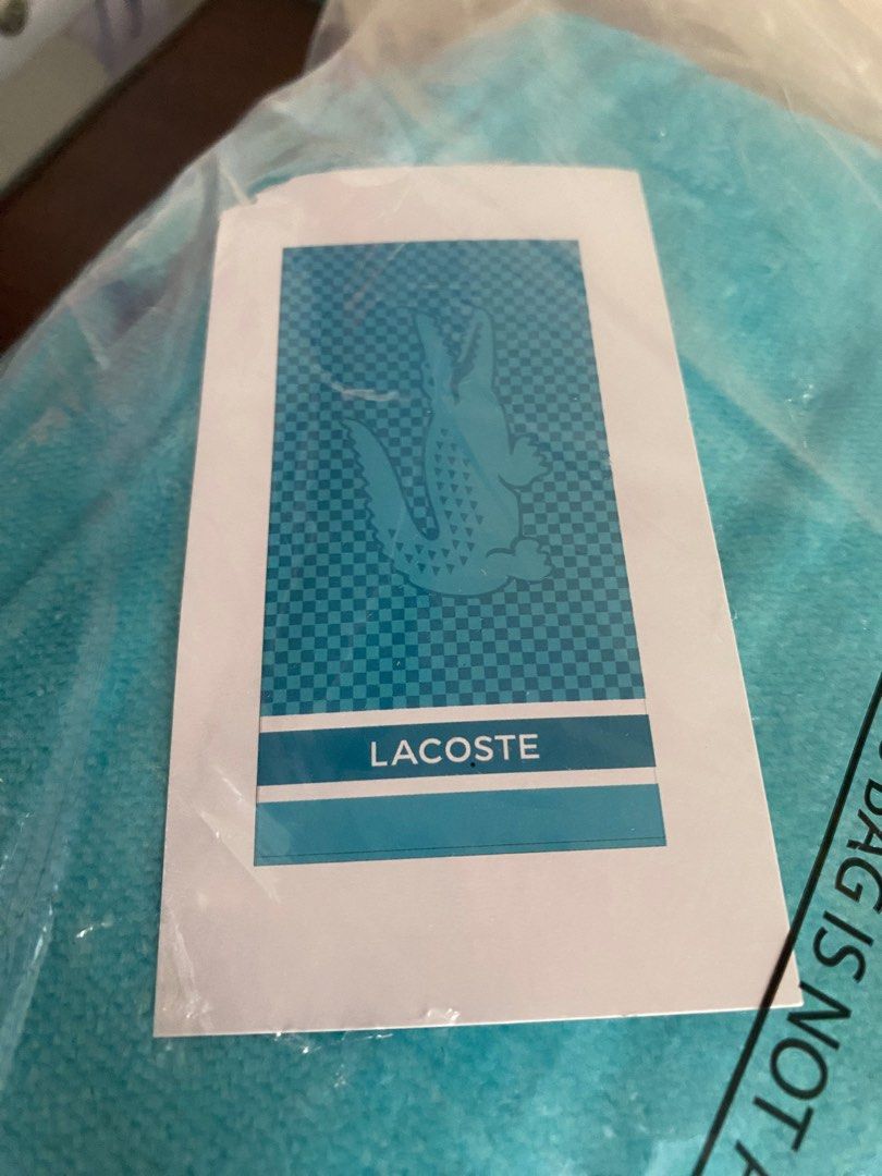 Lacoste Beach Towel (Category: Bedding & Towels) located in Quezon City. Submitted by titaus_cart (Listing ID 1402503183, Image 3). Description: - Brand new Lacoste beach towels - Available designs: - Blue with white stripes - Colorful stripes - Checkered pattern - Large Lacoste logo - Perfect for beach or pool use Big:36x72 inches 100% cotton.
