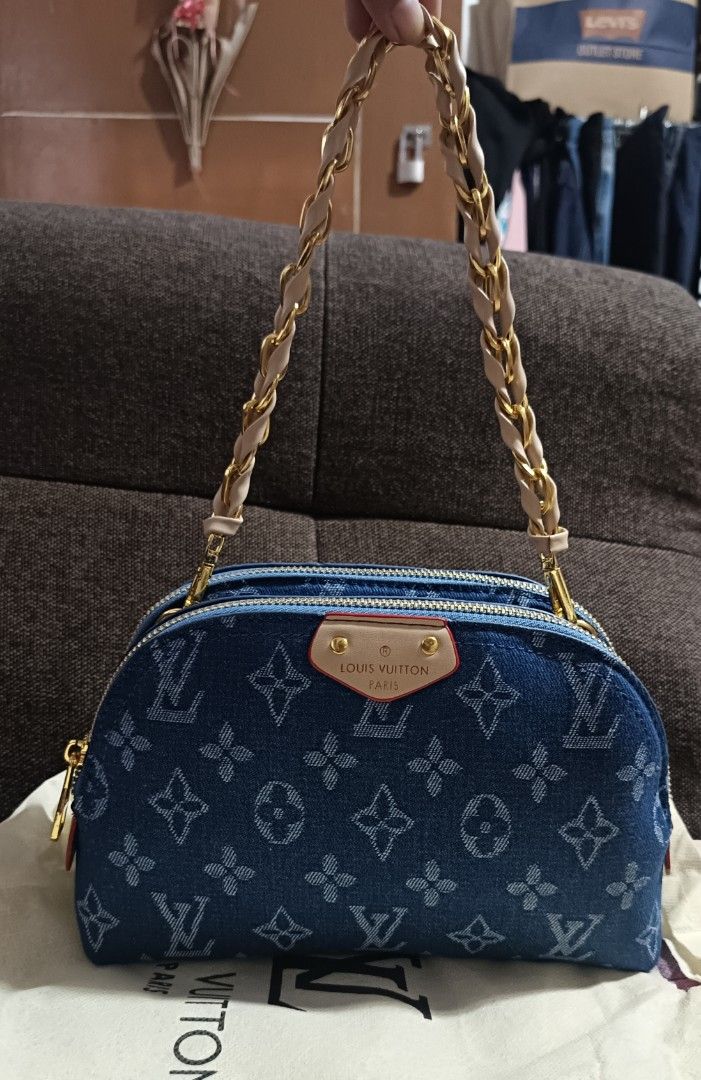 Louis Vuitton Denim Crossbody Bag (Category: Luxury Bags & Wallets) located in Valenzuela. Submitted by AnahThrift (Listing ID 1402604755, Image 2). Description: - Authentic Louis Vuitton Crossbody Bag - Denim exterior with LV monogram - Dual-compartment design - Gold-tone zippers - Chain strap and detachable handle - Brown fabric interior - Includes brand label and serial number.