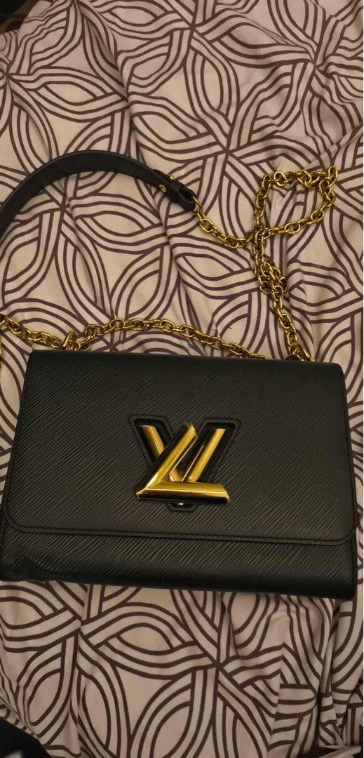 Louis Vuitton Twist Chain Black (Category: Luxury Bags & Wallets) located in Paranaque City. Submitted by federalland.alliyah (Listing ID 1402496037, Image 1). Description: - Authentic Louis Vuitton Twist Chain Wallet - Color: Black - Gold-tone chain strap - Gold-tone LV logo - Textured finish - Flap closure - Perfect for special occasions or daily use.