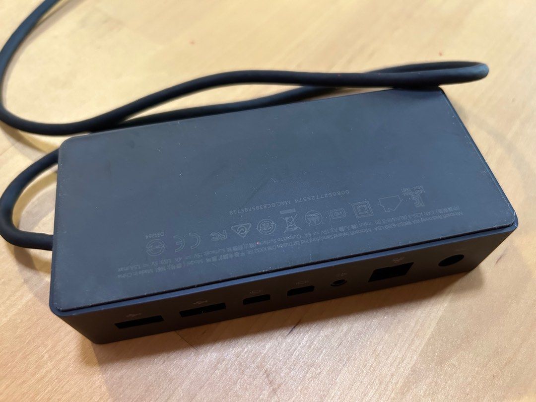 Microsoft Surface Dock (Category: Other Accessories) located in Singapore. Submitted by alvin_thong (Listing ID 1402571342, Image 3). Description: - Microsoft Surface Dock - Includes dock and attached cable - Connect to external displays, USB devices, etc. - Expands Surface device functionality.