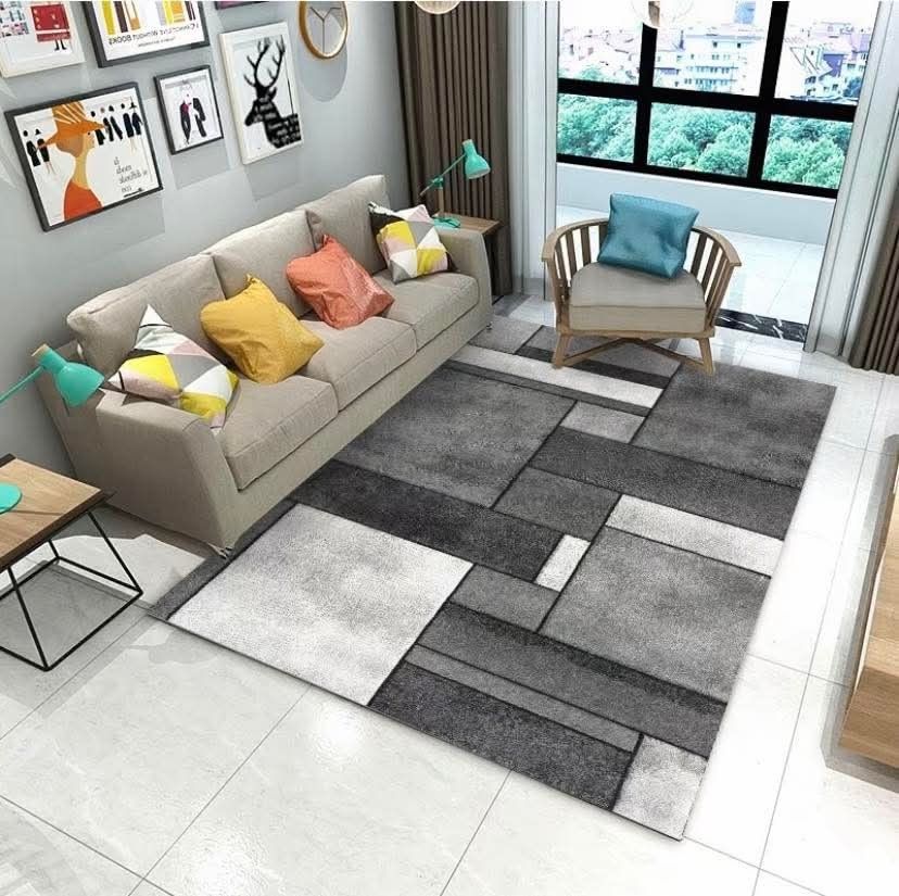 Modern Geometric Pattern Rug 5x6ft (Category: Carpets, Mats & Flooring) located in Manila. Submitted by yzlshop (Listing ID 1402531378, Image 2). Description: Stylish rug featuring a modern geometric design. The rug has a rectangular shape and is suitable for living rooms or bedrooms. It has a soft texture and a neutral color palette that complements various interior styles. The rug is designed to add warmth and visual interest to any space..