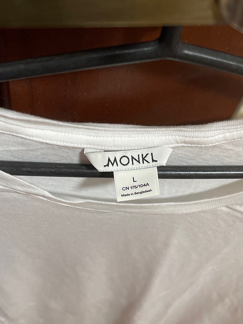 Monki White T-shirt - Size L (Category: Shirts) located in Antipolo. Submitted by j01000a (Listing ID 1402642032, Image 2). Description: - Monki white t-shirt - Size: L - Features: Round neckline, short sleeves - Made in Bangladesh - Lightweight and comfortable fabric - Versatile for various outfits.