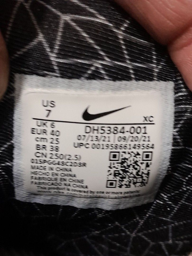 Nike Kyrie infinity Chinese New year (Category: Sneakers) located in Calamba. Submitted by ysabellascloset17 (Listing ID 1402479867, Image 3). Description: Nike Kyrie 8 EP sneakers. Features a white, blue, and orange color scheme. The size is US 7, EUR 40, and CM 25. The shoes have a unique design on the soles and the Nike logo is visible on the side. The shoes have black laces and a patterned design on the tongue..
