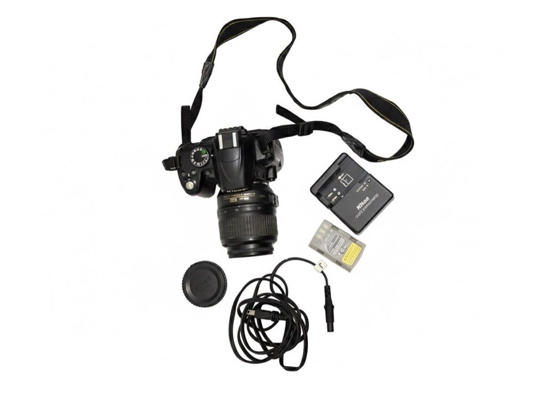 Nikon D3000 with 18–55mm lens (Category: Cameras) located in Manila. Submitted by dealornoodle (Listing ID 1402655994, Image 1). Description: NIKON D3000 with 18–55mm lens Shutter Count: 32,339 includes: - AF-S DX NIKKOR 18-55mm lens for Nikon condition: - shows signs of use - charger untested - vignette on camera screen, but does not affect photo quality or performance (see last photo).
