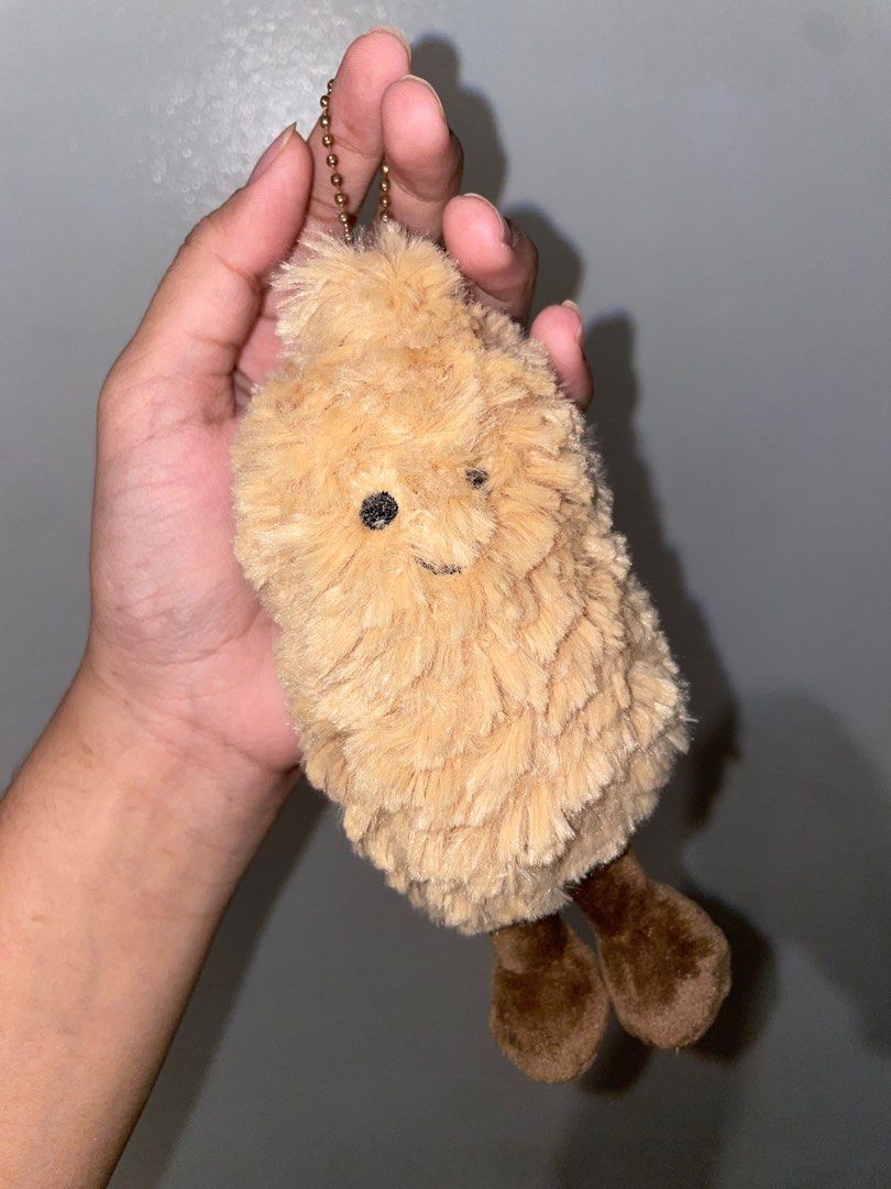 Peanut Jellycat Inspired Keychain/Pendant (Category: Charms) located in Manila. Submitted by thriftgod67 (Listing ID 1402634206, Image 2). Description: Jellycat inspired Peanut Keychain/Pendant Issue: Tarnishing chain No issues with peanut itself Bought in Glorietta Mop: Gcash No return refund exchange Loc: Pasig-Santolan .
