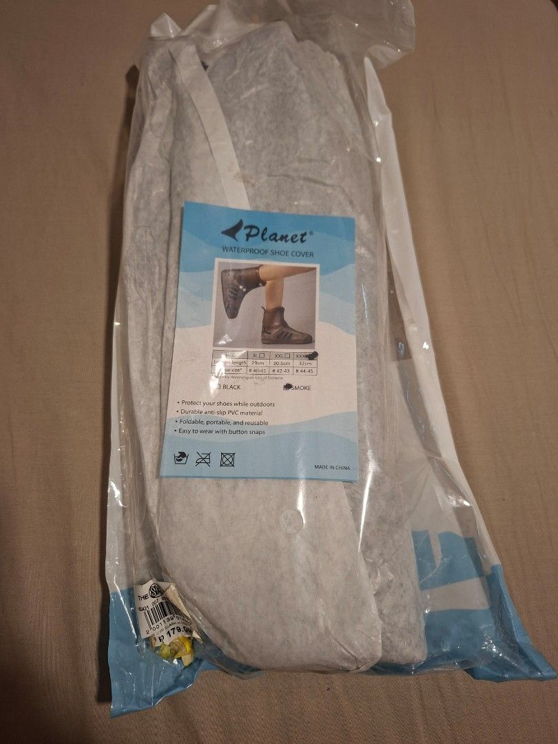 Planet Waterproof Shoe Cover (Category: Boots) located in Cabanatuan. Submitted by decluttercab (Listing ID 1402628222, Image 1). Description: never opened. bought it for 179.