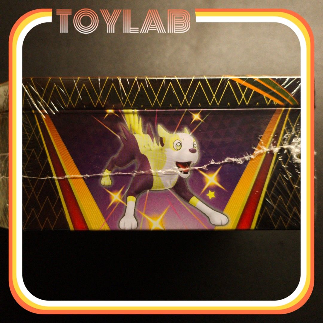 Pokemon Shining Fates Container Tin (Category: Card Boxes & Cases) located in Mandaluyong City. Submitted by ToyLab.ph (Listing ID 1402495972, Image 3). Description: - Sealed Pokemon Shining Fates Tin - Features artwork of a Pokemon - Black tin with gold accents - Empty tin for ypur card storage - Unopened and in original packaging Gcash Payment Lalamove or Grab care of buyer Thank you. 🙂.