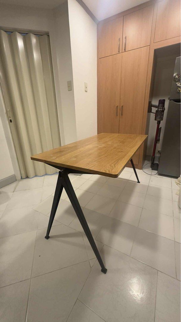 Pyramid Table 01 - Design Story (Category: Tables & Sets) located in Caloocan City. Submitted by cristinaer27011 (Listing ID 1402600038, Image 1). Description: Pyramid Table 01 bought from Design Story Bought for 70k - Clear Lacquered Solid Oak w/Black base - BRAND: HAY - 21 mm tabletop in solid oak with a straight edge. Frame in powder-coated steel sheet. - L140 X W65 X H74 CM. .