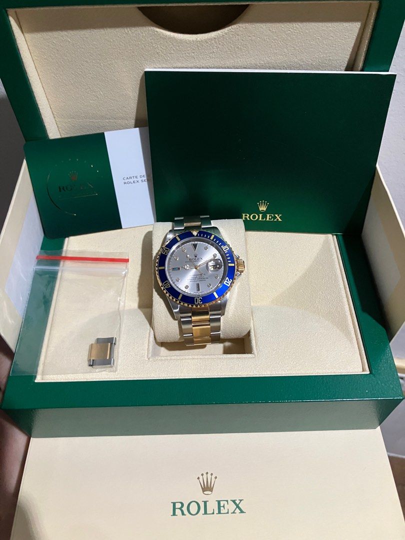 Rolex Submariner ref 16613 Two Tone Serti Slate Dial (Category: Luxury Watches) located in Quezon City. Submitted by ipeelpinney (Listing ID 1402573890, Image 1). Description: ❕This watch IS FOR SERIOUS WATCH COLLECTORS & ENTHUSIASTS❕ 💎 RARE 2008 Rolex Two Tone Submariner Bluesy Serti Silver Sultan Dial (rarer and more prestigious than the champagne colored dial) ✅ NEWLY-SERVICED (Complete Overhaul, case & bracelet refinishing and cleaning) by R