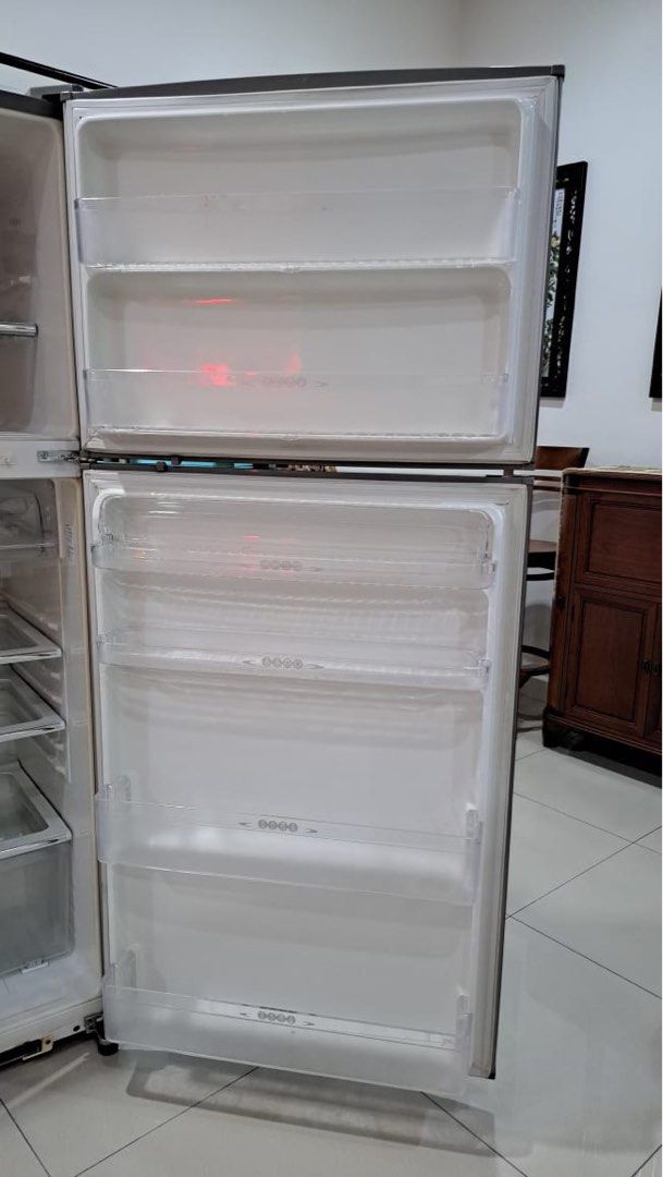 Sharp Refrigerator (Category: Refrigerators & Freezers) located in Kuala Lumpur. Submitted by yeeni96 (Listing ID 1402603986, Image 3). Description: Still in good condition.