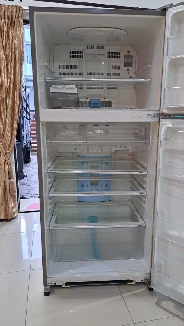 Sharp Refrigerator (Category: Refrigerators & Freezers) located in Kuala Lumpur. Submitted by yeeni96 (Listing ID 1402603986, Image 2). Description: Still in good condition.