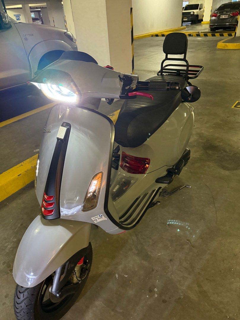 Vespa Sprint S 150 Scooter (Category: Motorbikes for Sale) located in Makati City. Submitted by johnnyenodengon (Listing ID 1402501402, Image 2). Description: Vespa Sprint S150 2022 Complete papers 5k Mileage as of posting Newly Registered 2026 Complete with manual and booklet With plate number Blue & Brown keys Malossi Center Spring Akrapovic exhaust JS shorty lever Tinted winkers Tinted gauge Black rack Vespa Clear Head Cover Clear Cylinder Hea