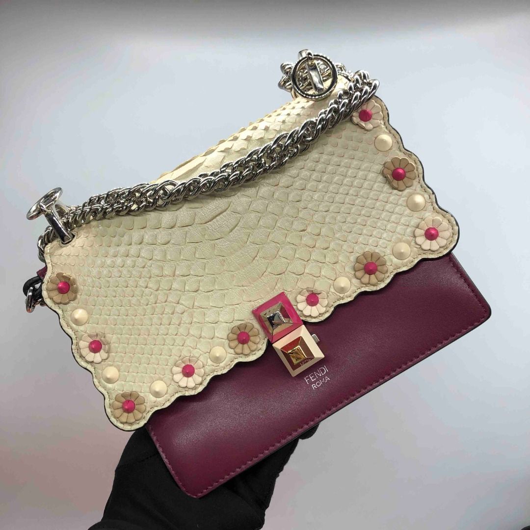 SALE!!!! 247000325 FENDI KAN I PYTHON BAG (Category: Luxury Bags & Wallets) located in Taguig. Submitted by ecoring.ph (Listing ID 1280919266, Image 1). Description: Condition: AB Size: W18 H16 D9 cm Other defects/info: SUEDE IS A BIT LOOK DIRTY BUT THE REST IS OKAY WITH DUSTBAG Please note that our pieces are either used or pre-owned, and hence may come with certain defects / signs of usage as commonly seen in secondhand goods. *Please do not us