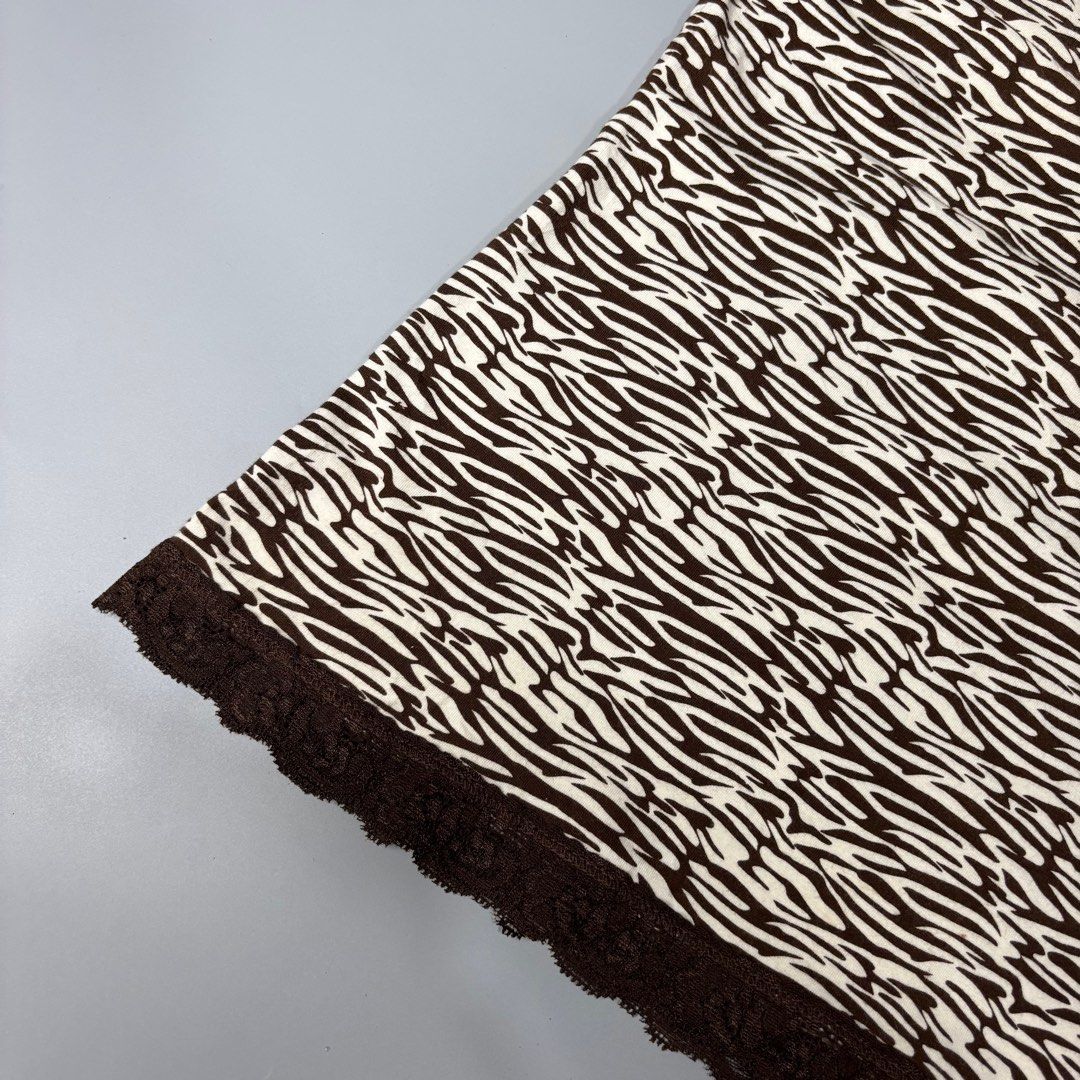 Arizona Zebra Print Cami Top (Category: Sleeveless) located in Angeles City. Submitted by tey68 (Listing ID 1402800551, Image 2). Description: Arizona camisole features a unique zebra print. It has brown straps and trim, with lace detailing along the neckline and hem. The tag indicates it is a Favorite Cami, made in Vietnam. It is a size L/G, equivalent to 14/16..