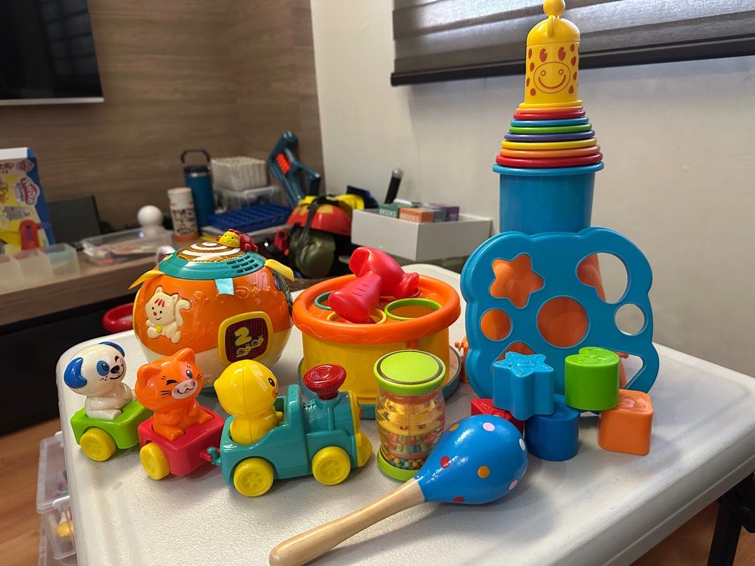 Assorted Baby Toys Set (Category: Kids Toys) located in Manila. Submitted by momfinds.mnl (Listing ID 1402674182, Image 1). Description: Includes Vtech Ball, needs battery replacement. Price is for whole set..