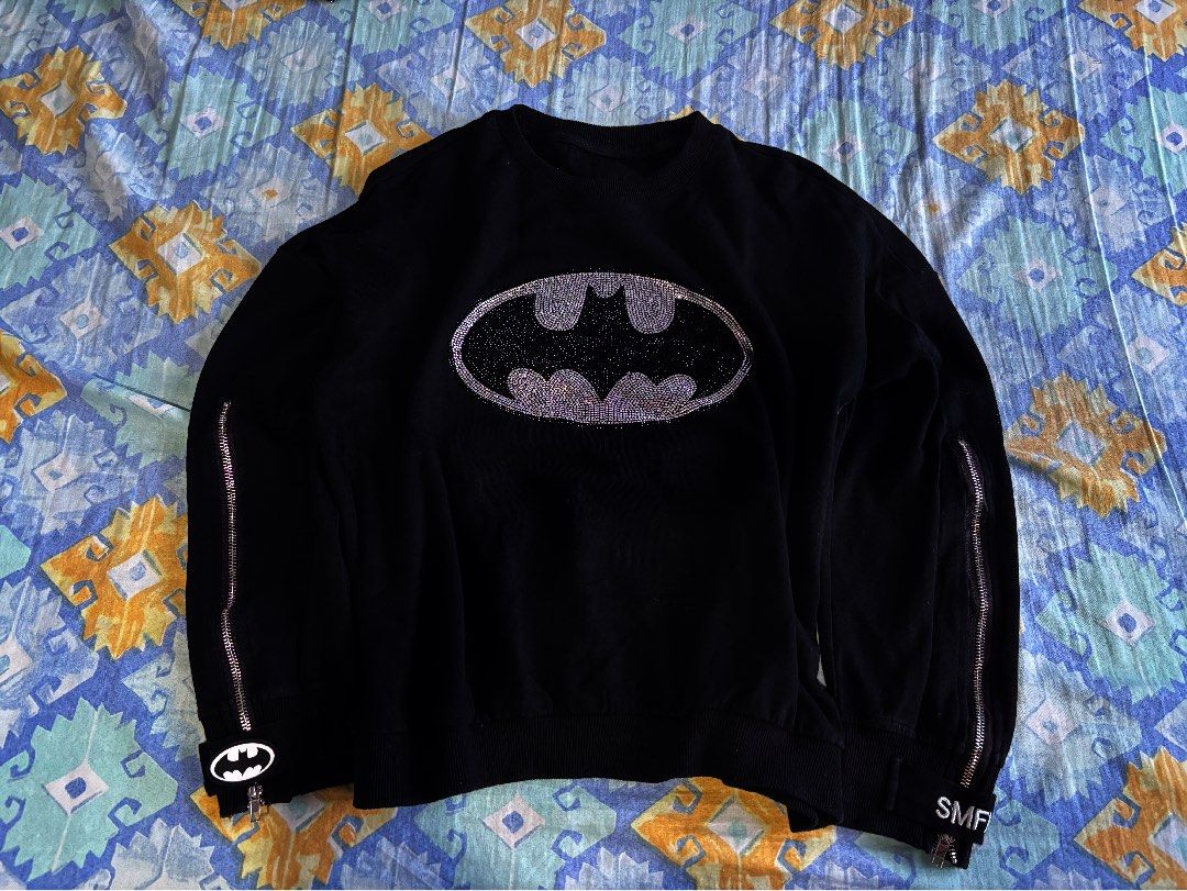 Black Batman Sweatshirt with Rhinestones (Category: Longsleeves) located in Orani. Submitted by cathsclothing (Listing ID 1402711022, Image 2). Description: - Black Batman logo sweatshirt - Embellished with rhinestones - Sleeve zippers - "SMFK" embroidered cuffs - Made of soft material - Tag visible Size: can fit Medium to Large .