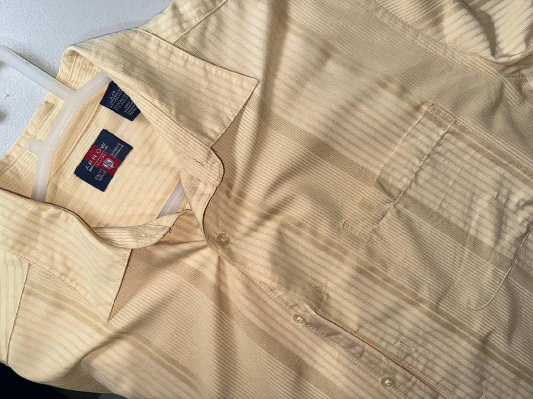 Boxy Polo (Arrow Brand) (Category: Tshirts & Polo Shirts ) located in Bulacan. Submitted by streethrifter (Listing ID 1402752726, Image 3). Description: Boxy Polo (Arrow Brand) 📏 Size • Width: 20 inches • Front Length: 25 inches • Back Length: 27 inches 🧸 Condition • 10/10 — Good as new • No issues: no fading, no pinholes, no stains 🎨 Color • Washed yellow (soft tone, not too vibrant) ✨ Features • Boxy fit — not cropped or awkwardly short • Ba