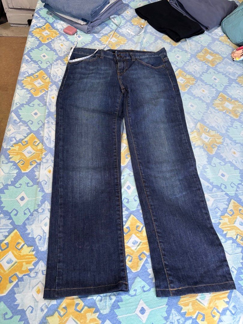 Calvin Klein Jeans (Category: Jeans) located in Orani. Submitted by cathsclothing (Listing ID 1402693110, Image 2). Description: - Dark wash Calvin Klein jeans - Made in Mauritius - Waist: 27 inches on tag but can fit to 29-31” - Length: 36.5” - Features Calvin Klein logo on back pockets - Button closure with Calvin Klein branding.
