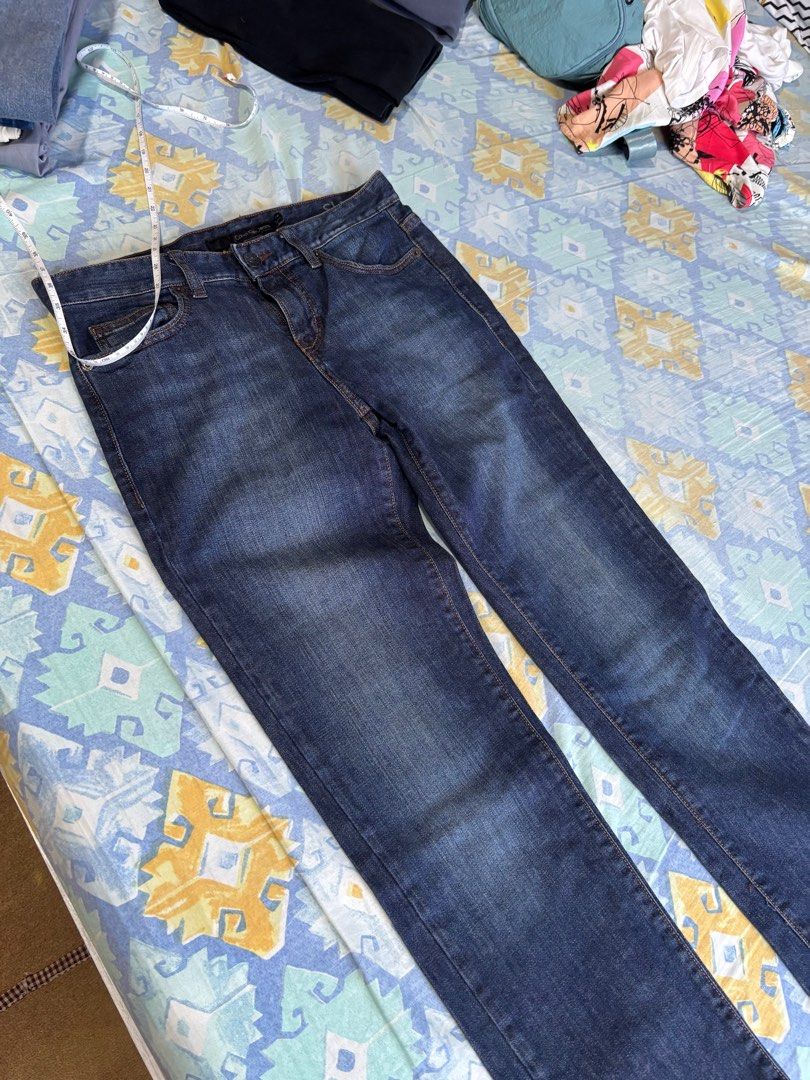 Calvin Klein Jeans (Category: Jeans) located in Orani. Submitted by cathsclothing (Listing ID 1402693110, Image 3). Description: - Dark wash Calvin Klein jeans - Made in Mauritius - Waist: 27 inches on tag but can fit to 29-31” - Length: 36.5” - Features Calvin Klein logo on back pockets - Button closure with Calvin Klein branding.