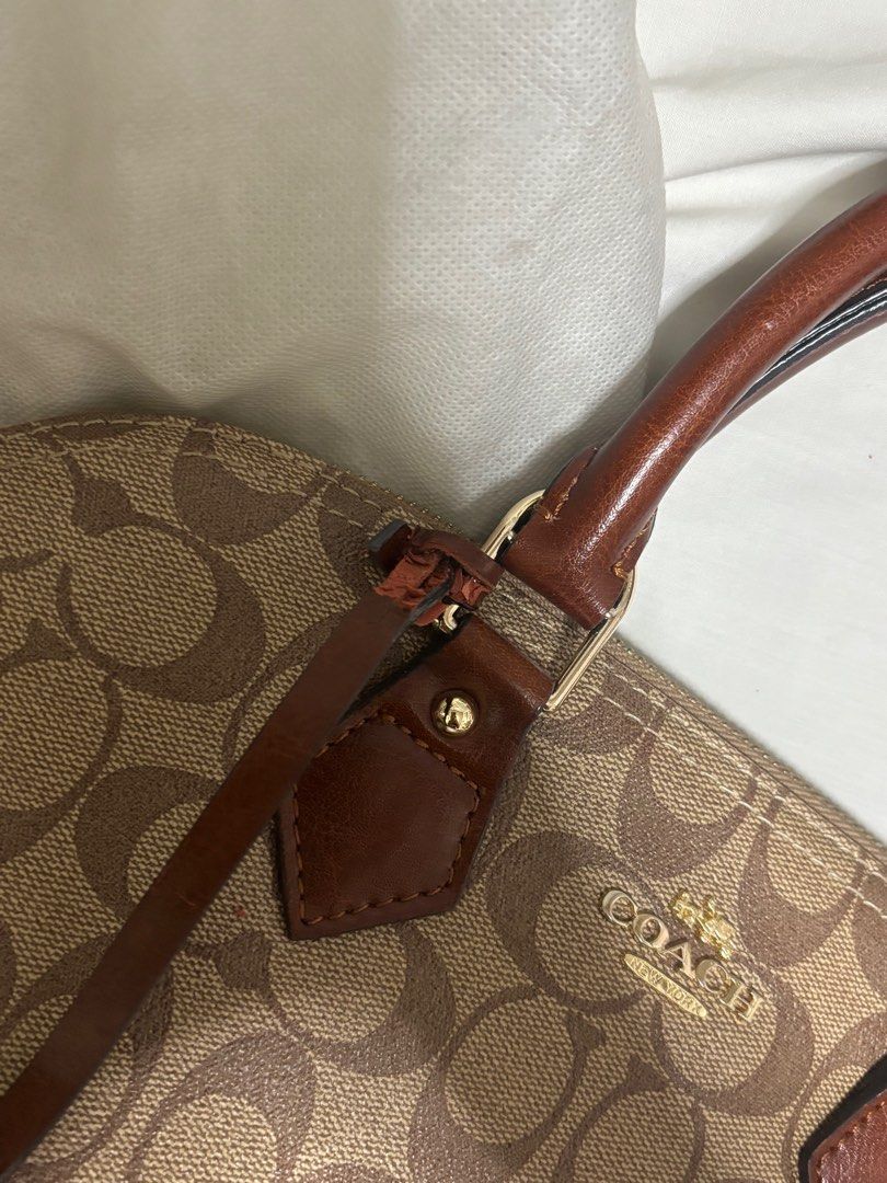 Coach Sierra Satchel (Category: Luxury Bags & Wallets) located in Manila. Submitted by littleflowerbasket (Listing ID 1402821543, Image 3). Description: For Sale: Coach Sierra Satchel Comes with the box, Complete Inclusions Price: 1800 Condition: Mint, has some light peeling (see pic for reference) - Location: QC, Metro Manila - MOD: jnt, lalamove, grab - MOP: gcash or bpi - Onhand.