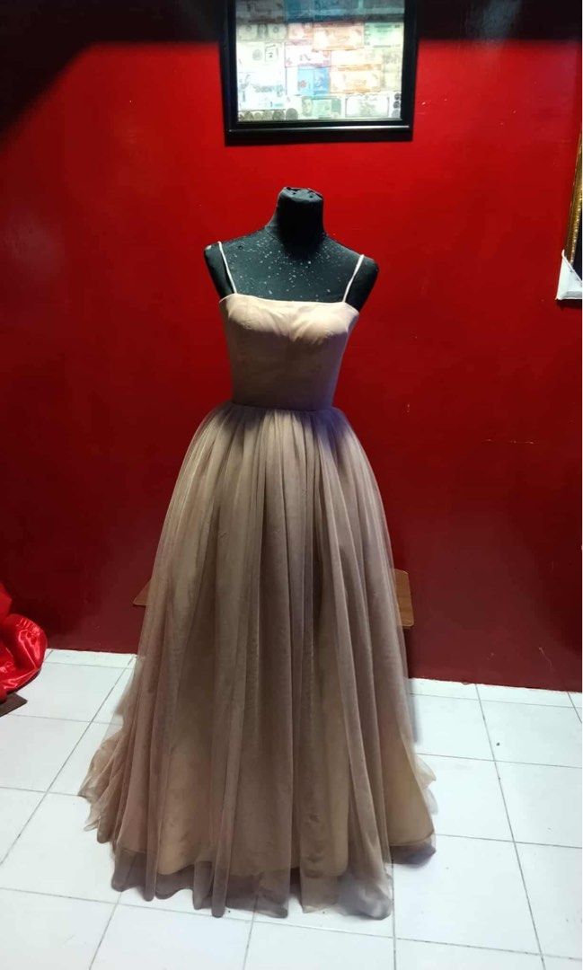 Custom made Taupe tulle gown (w/ small train) (Category: Evening dresses & gowns) located in Paranaque City. Submitted by ilovecokezero (Listing ID 1402770677, Image 1). Description: - brand new, custom-made, only tried on - super nice!! Tempted to keep, but don’t have an event coming up to use it hehe - rfs: declutterring - measurements: Shoulder 14” Bust 31” Waist 24” Figure 16” Skirt length 41” - no when worns - slightly negotiable, no low-bal