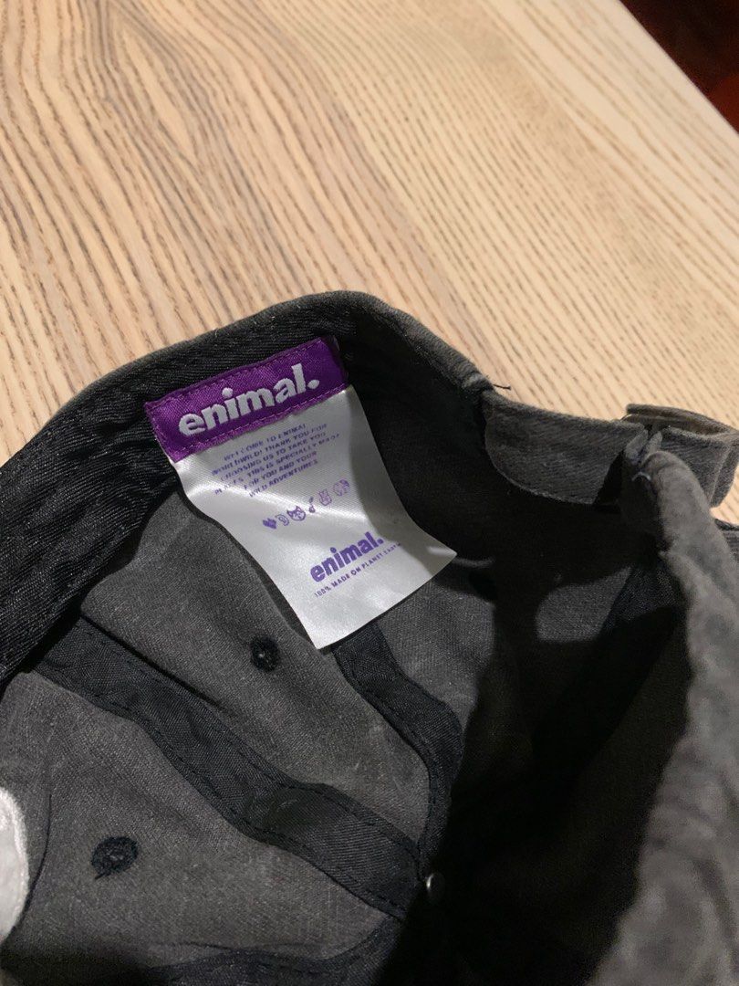 Enimal Cap (Category: Caps & Hats) located in Quezon City. Submitted by basilisksix (Listing ID 1402686293, Image 3). Description: Dark grey Enimal cap, good condition .