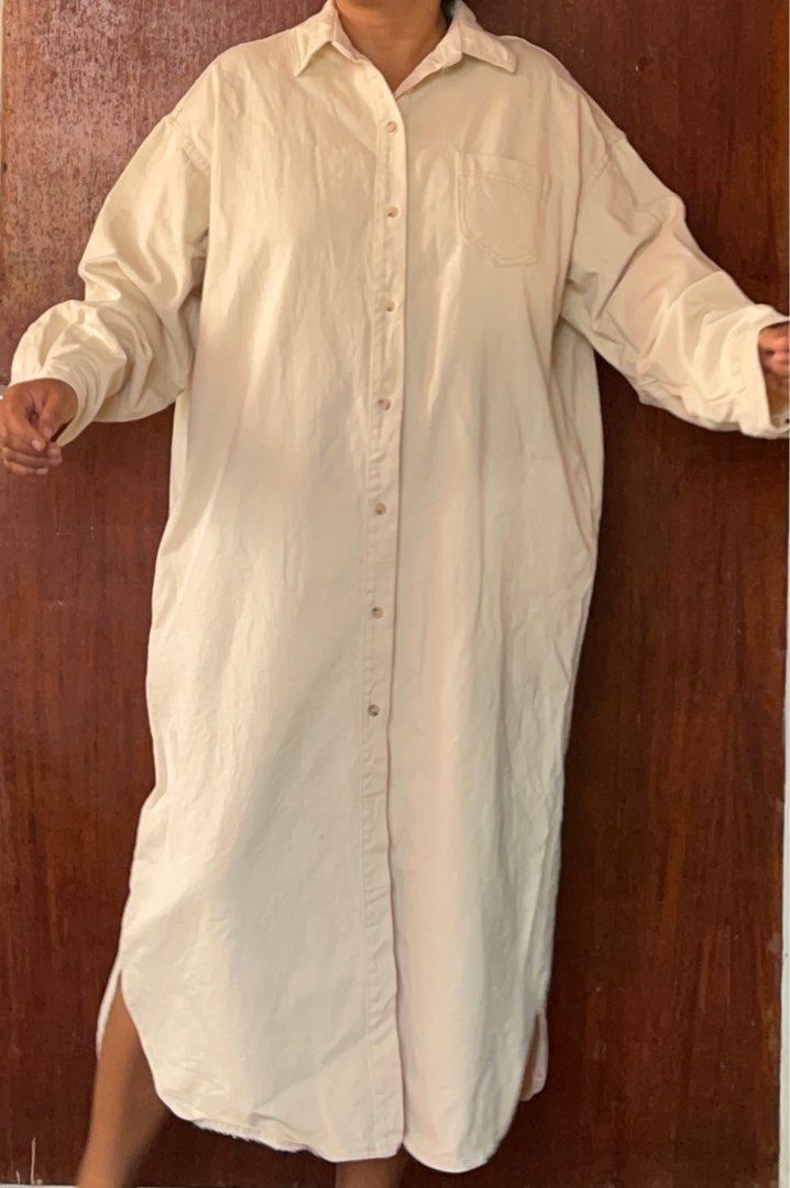 High Quality Moodning Long Dress (Category: Dresses) located in Toledo. Submitted by klnmia (Listing ID 1402727444, Image 1). Description: - Moodning long dress - Collared neckline - Button-down closure - Single chest pocket - Long sleeves - Midi length - Light beige/cream color - Medium-weight fabric.