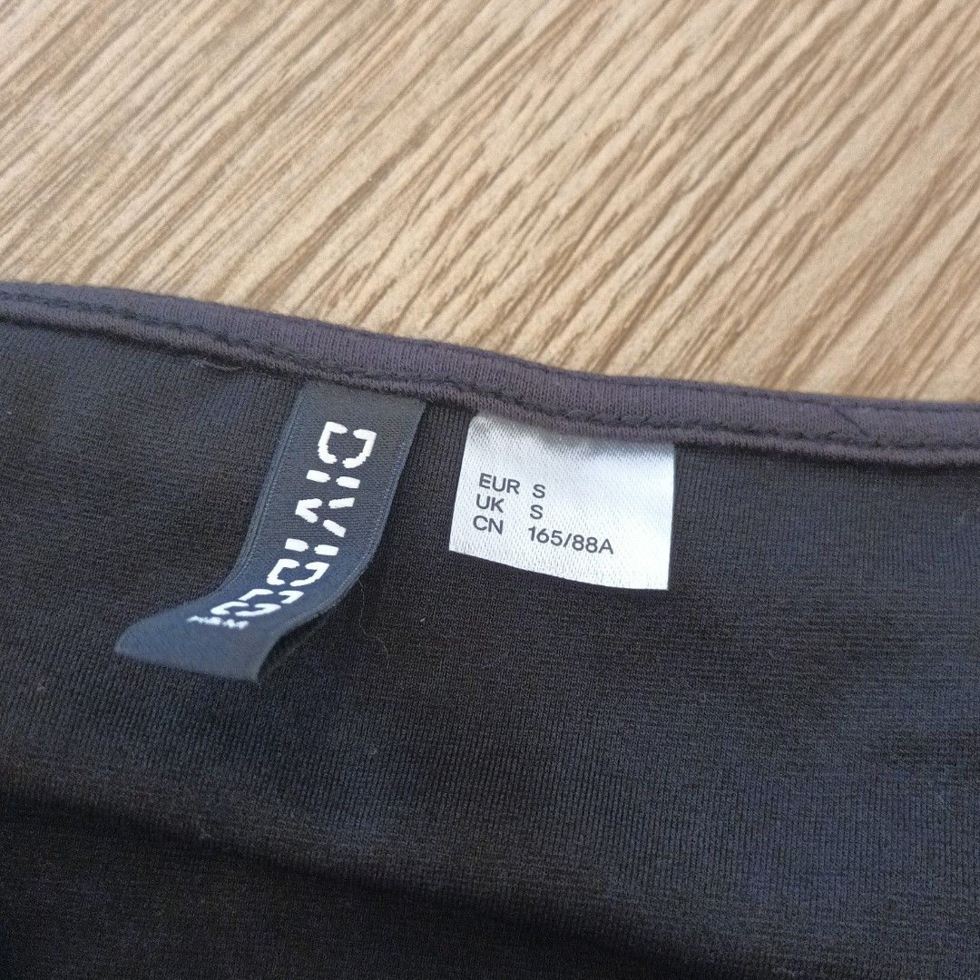 H&M Black Mini Dress with Rhinestone Straps (Category: Dresses) located in Makati City. Submitted by cdiana (Listing ID 1402790483, Image 3). Description: - H&M black mini dress - size S, comes with H&M paper bag - flaw: some rhinestones became dark, pls see the actual photos - used once for an event - Fitted silhouette - Small slit at the hem.