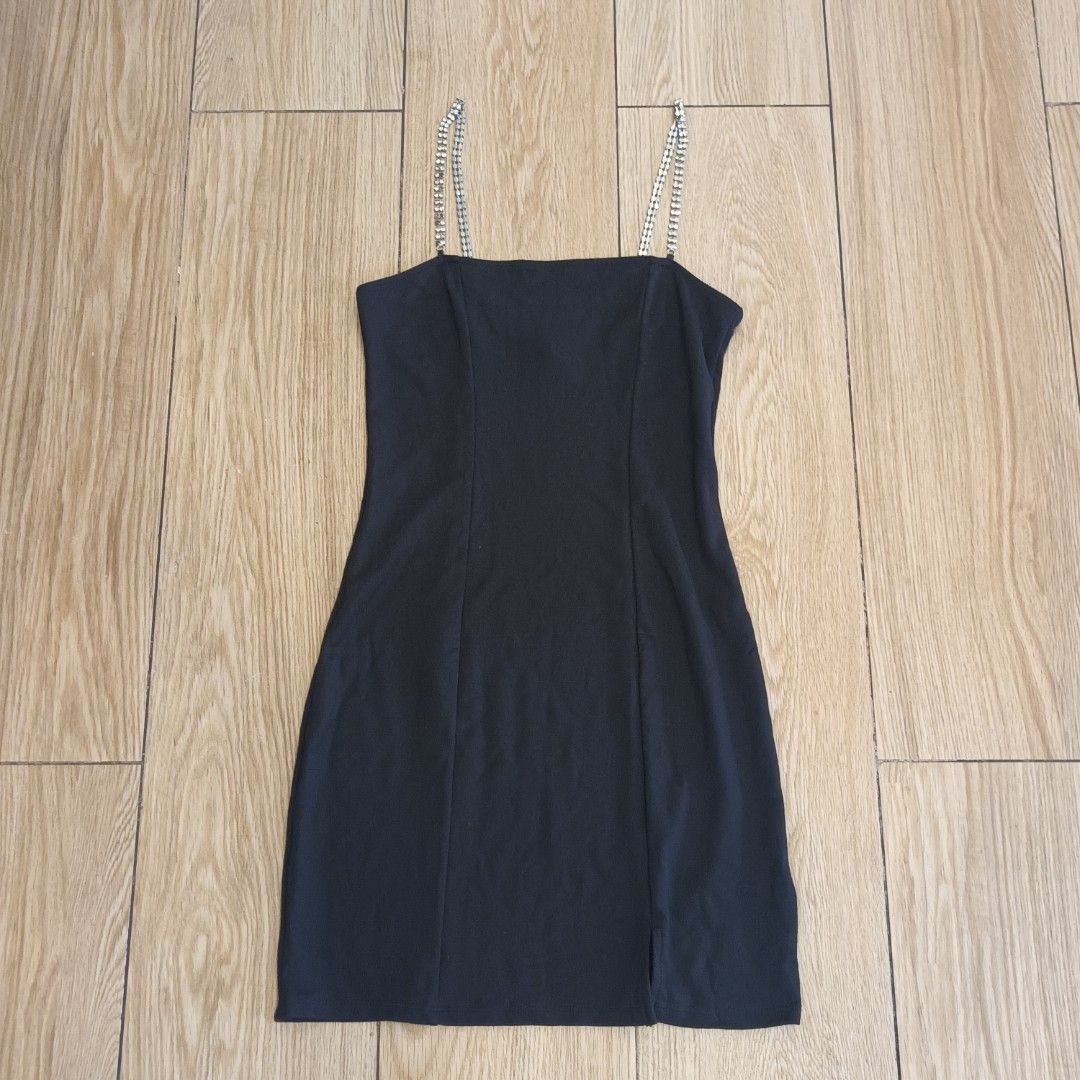 H&M Black Mini Dress with Rhinestone Straps (Category: Dresses) located in Makati City. Submitted by cdiana (Listing ID 1402790483, Image 2). Description: - H&M black mini dress - size S, comes with H&M paper bag - flaw: some rhinestones became dark, pls see the actual photos - used once for an event - Fitted silhouette - Small slit at the hem.