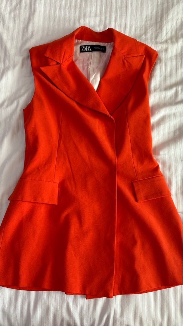 H&M Orange Sleeveless Casual Blazer (Category: Others Tops) located in Taguig. Submitted by ms.gf (Listing ID 1402702639, Image 2). Description: .