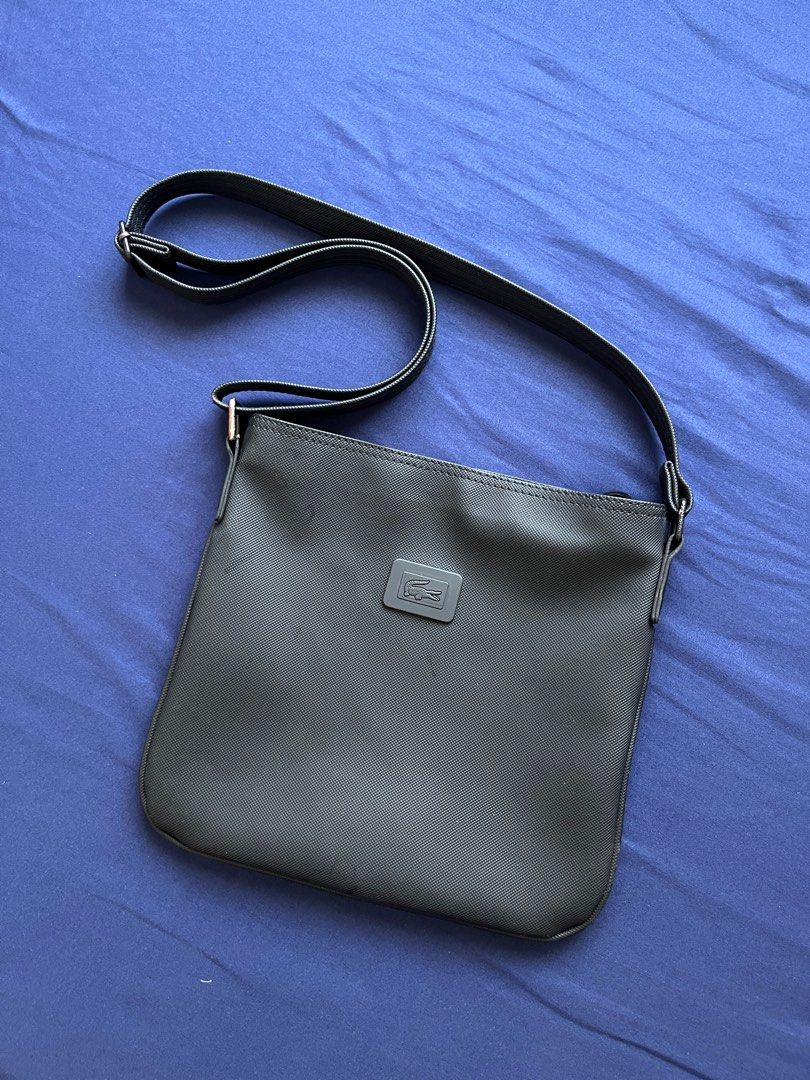 Lacoste Cross Body Bag (Category: Luxury Bags & Wallets) located in Cagayan de Oro. Submitted by aeiith (Listing ID 1402693489, Image 2). Description: Can fit tablet 10" Unisex Location: CDOC.