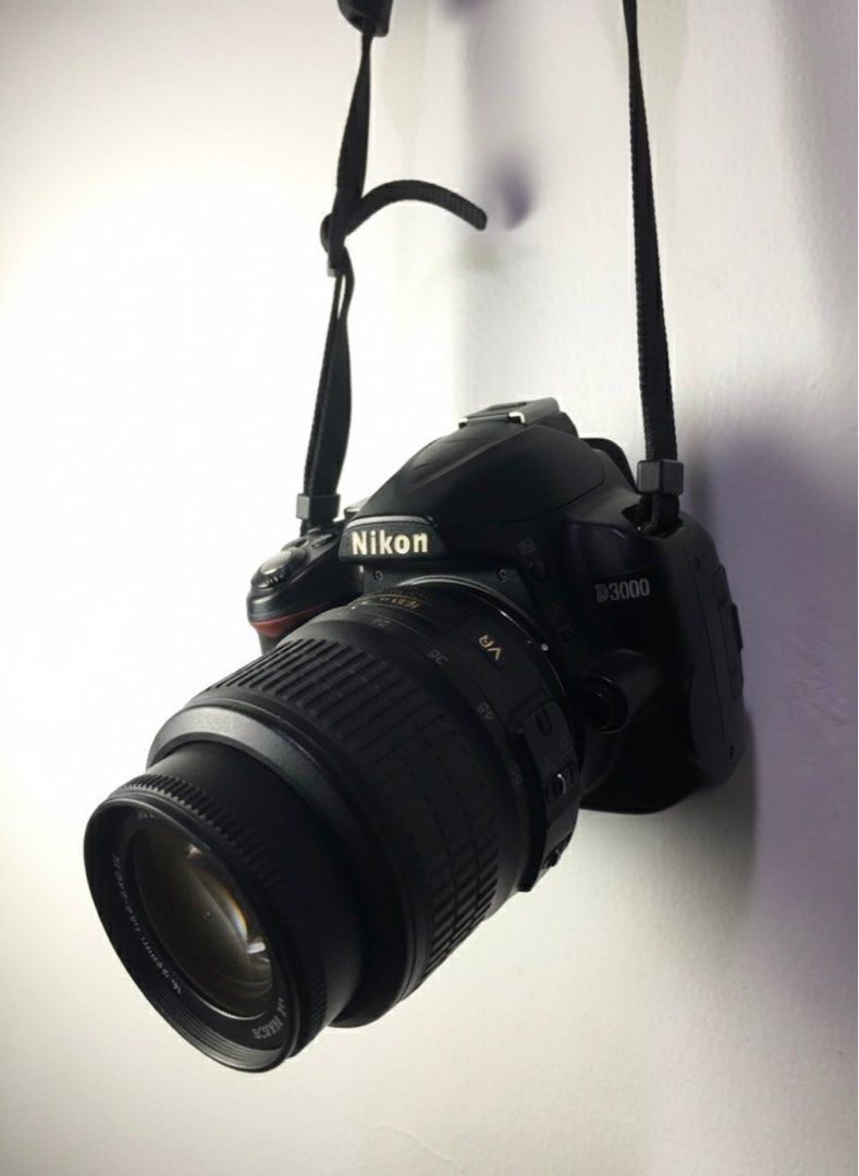 Nikon D3000 with 18–55mm lens (Category: Cameras) located in Manila. Submitted by dealornoodle (Listing ID 1402655994, Image 2). Description: NIKON D3000 with 18–55mm lens Shutter Count: 32,339 includes: - AF-S DX NIKKOR 18-55mm lens for Nikon condition: - shows signs of use - charger untested - vignette on camera screen, but does not affect photo quality or performance (see last photo).