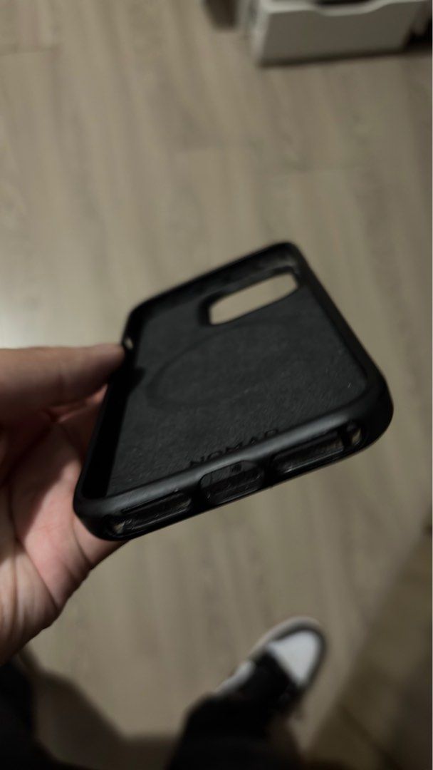 Nomad iPhone 13 Pro Leather Case (Category: Cases & Sleeves) located in Manila. Submitted by angelobggnn (Listing ID 1402768655, Image 3). Description: Nomad for iPhone 13 Pro Check photos for flaws. But I think a leathersmith can fix the top edge. Pick up at BGC..