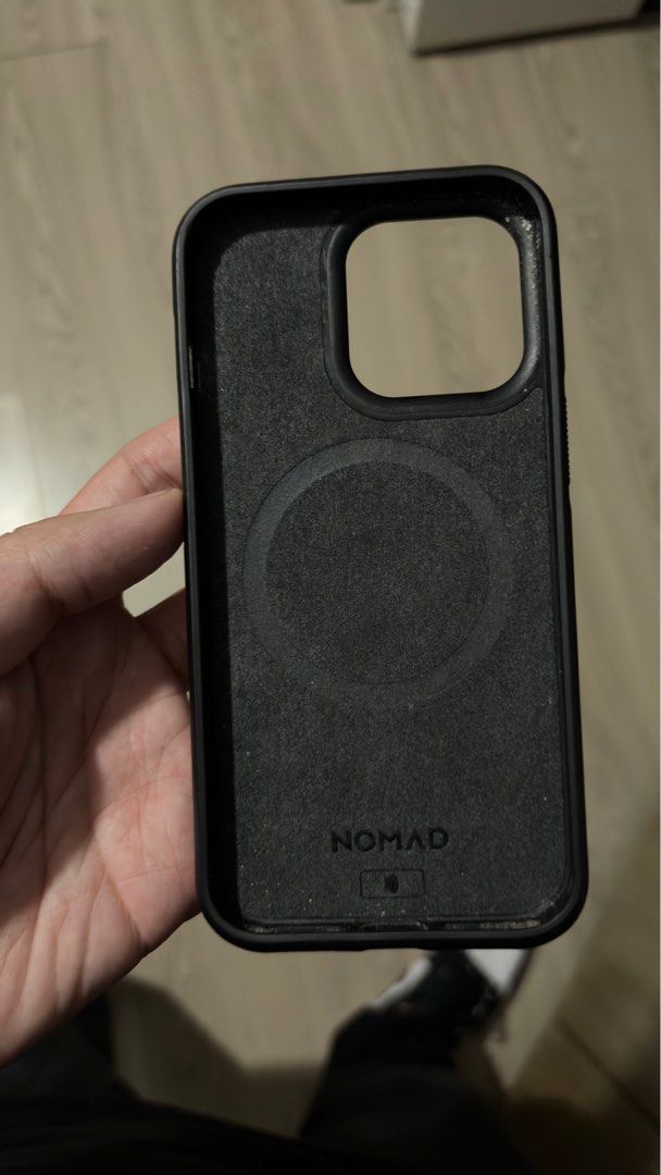 Nomad iPhone 13 Pro Leather Case (Category: Cases & Sleeves) located in Manila. Submitted by angelobggnn (Listing ID 1402768655, Image 2). Description: Nomad for iPhone 13 Pro Check photos for flaws. But I think a leathersmith can fix the top edge. Pick up at BGC..