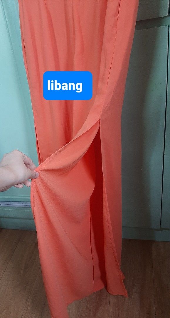 Nordic Winds Orange Jumpsuit with slits (Category: Jumpsuits) located in Paranaque City. Submitted by jiggsly (Listing ID 1402675851, Image 3). Description: - Nordic Winds orange jumpsuit - Size: L - Features: - Sleeveless design - Keyhole back - Side slits - Round neckline - Back zipper closure.