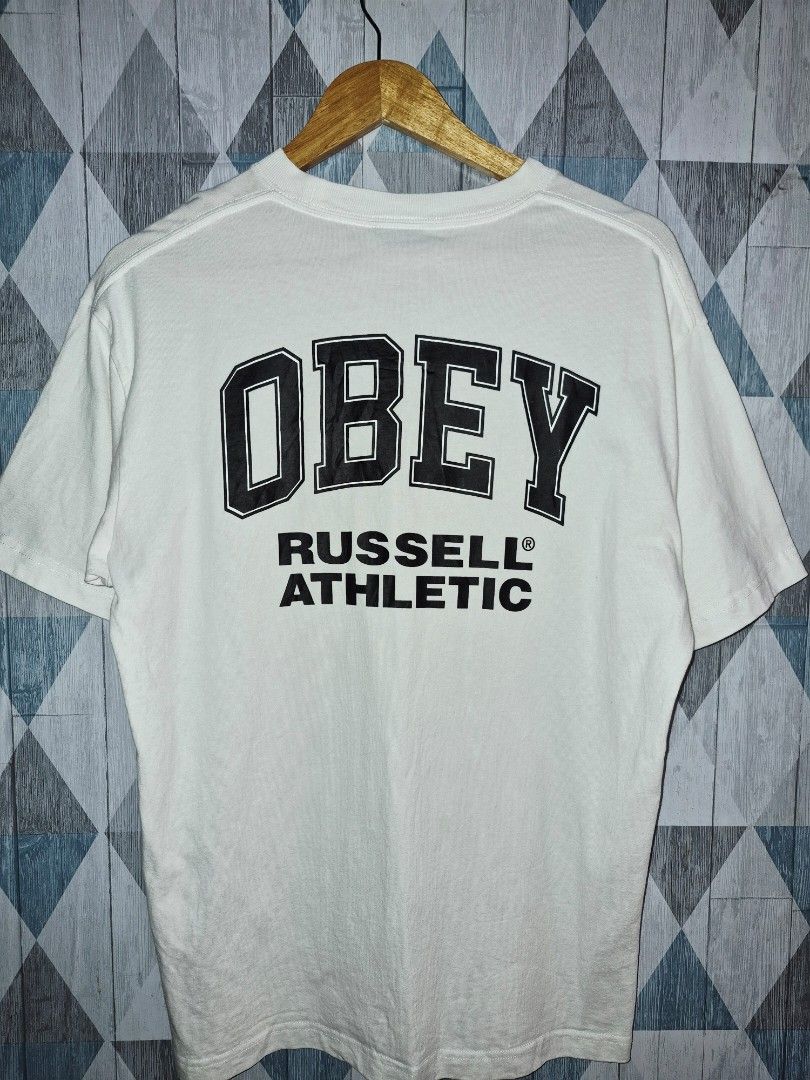 Obey Russell Athletic T-shirt (Category: Tshirts & Polo Shirts ) located in Ilagan. Submitted by jacobsthrift07 (Listing ID 1402823865, Image 1). Description: - Obey t-shirt - Size: M-L - Features: Small front logo, large "OBEY" back print - Brand: Russell Athletic - Material: Comfortable fabric - Perfect for casual wear.