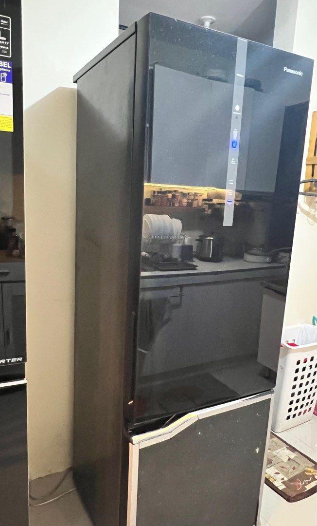 Panasonic Bottom Freezer Refrigerator Inverter (2 door) (Category: Refrigerators and Freezers) located in Las Pinas. Submitted by myluckyeight (Listing ID 1402820981, Image 2). Description: 13 cu.ft. Two Door Bottom Freezer Glass door, black color No frost, inverter With digital temperature set up With deodorizer Well used and fully functional RFS : bought a bigger one.