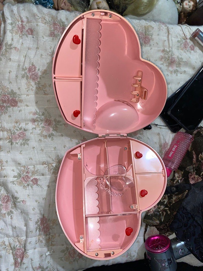 pink heart coquette organizer (Category: Accessory Holder, Box & Organizers) located in Manila. Submitted by vleinn_cantreplytoyall (Listing ID 1402788376, Image 1). Description: - Pink heart-shaped organizer. - Coquette aesthetic. - Features multiple compartments for storage. - Includes hooks and various storage sections. - Vintage collectible. - Good condition..