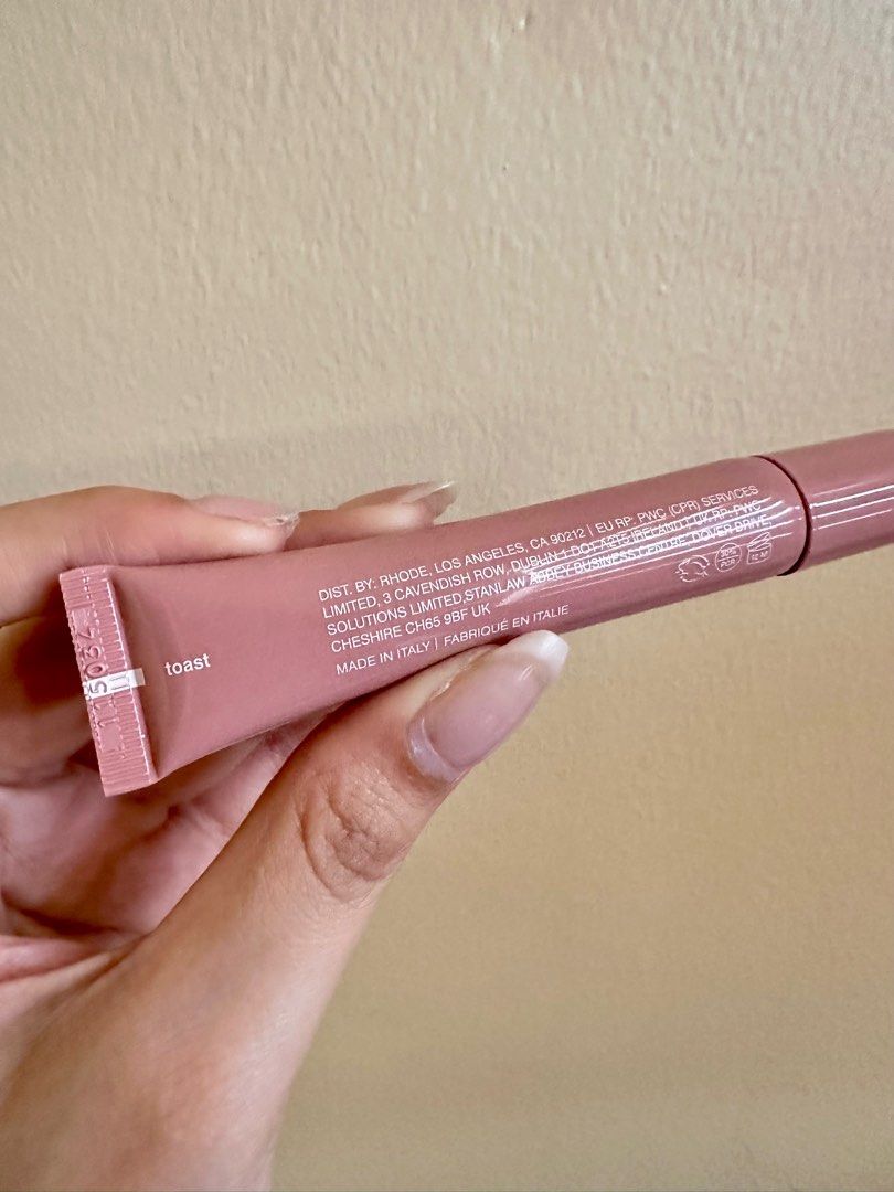 Rhode Peptide Lip Tint - Toast (Category: Makeup) located in Manila. Submitted by njddd (Listing ID 1402667023, Image 2). Description: - NEW NO BOX (ORIGINAL) -clean and sanitized -Rhode Peptide Lip Tint in Toast - Provides subtle color and hydration - Made in Italy - Contains peptides.