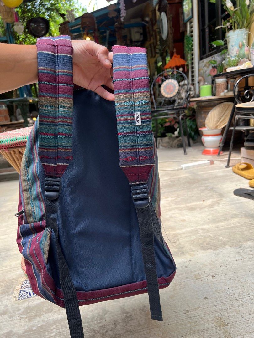 Vans Backpack (Category: Backpacks) located in Petaling Jaya. Submitted by kahoehon (Listing ID 1402808029, Image 3). Description: Vans backpack features a unique striped pattern with a front pocket and a leather patch. It has adjustable shoulder straps and a top handle. The interior has a main compartment and a smaller pocket. COD: Taman Tun, KL.