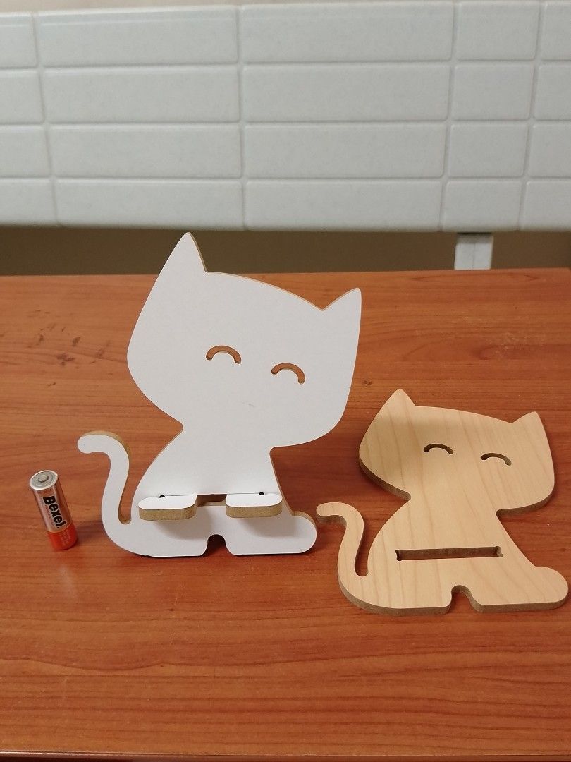 Wooden Cat design cellphone stand (Category: Mounts & Holders) located in Quezon City. Submitted by bees.kitty (Listing ID 1402834665, Image 1). Description: Wooden Cat design cellphone stand P50 - never used - sold as is - no reservation ‎- no pm, no transaction ‎- first to confirm and pay gets the item.