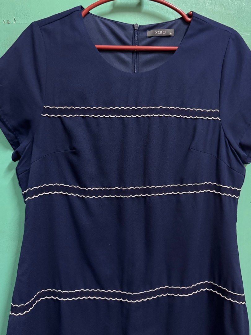 Xara Navy Blue Stripes Dress (Category: Dresses) located in Manila. Submitted by simplyjane01 (Listing ID 1402684014, Image 2). Description: Xara navy blue stripes dress - size: medium - Round neckline - Short sleeves - White scalloped trim details - Back zipper closure 💰Mode of payment: Gcash 📍 Pick up Location: Tondo, Manila. Exact address will be provided once payment has been received. 🛵 Delivery via courier (Grab/Lalamove, etc.) to be boo