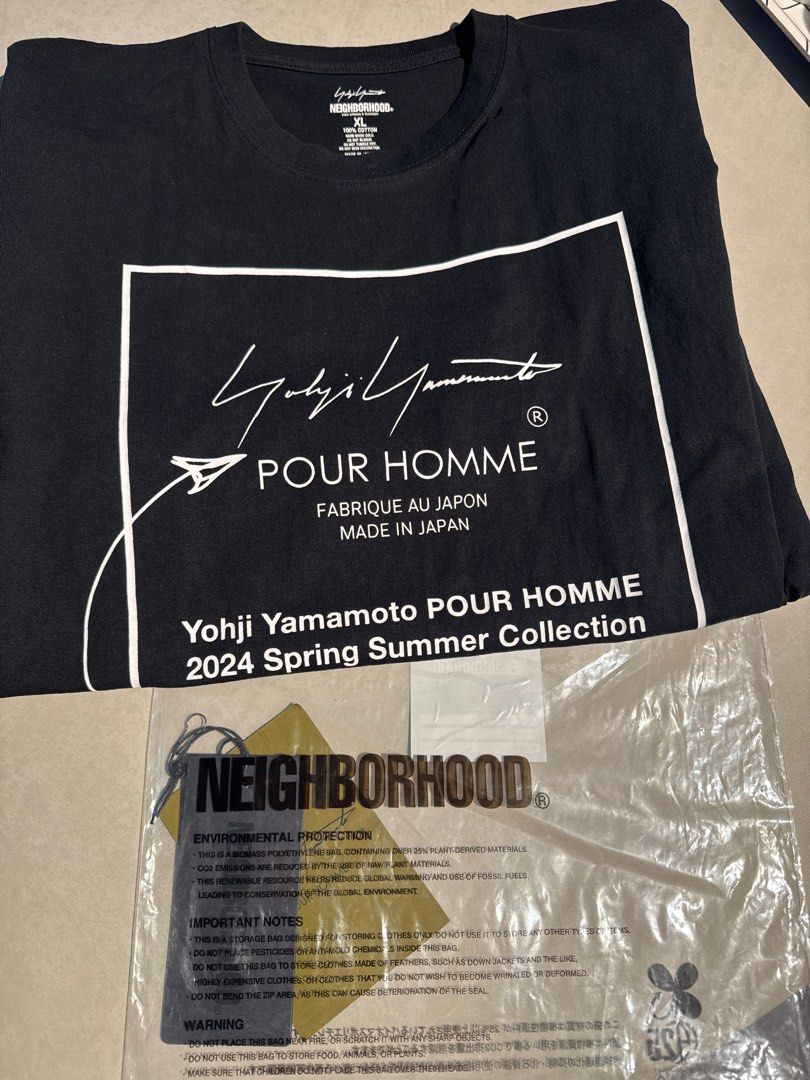 Yohji Yamamoto POUR HOMME x Neighborhood T-shirt (Category: Tshirts & Polo Shirts) located in Singapore. Submitted by goshhhhhhhh (Listing ID 1402728123, Image 2). Description: - Brand new Yohji Yamamoto POUR HOMME T-shirt - From the 2024 Spring Summer Collection - Collaboration with Neighborhood - Made in Japan - Comes with original tags and packaging.