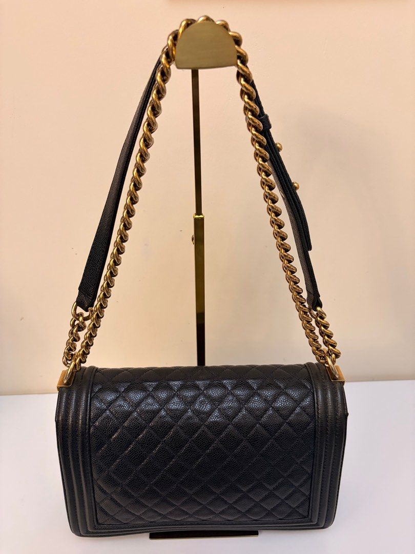 Authentic Chanel Caviar Navy Blue New Medium Leboy Flap Bag (Category: Luxury Bags & Wallets) located in Rizal. Submitted by SummerPeaCloset (Listing ID 1403028394, Image 3). Description: I’m selling my authentic Chanel Caviar Leboy Bag in new medium size. Color navy blue Selling for Php 179900 Specifications: - Brand: Chanel - Condition: Good - Material: Caviar Leather - Usage: Light Usage - Category: Bags - Inclusion: Original Brand Dustbag All