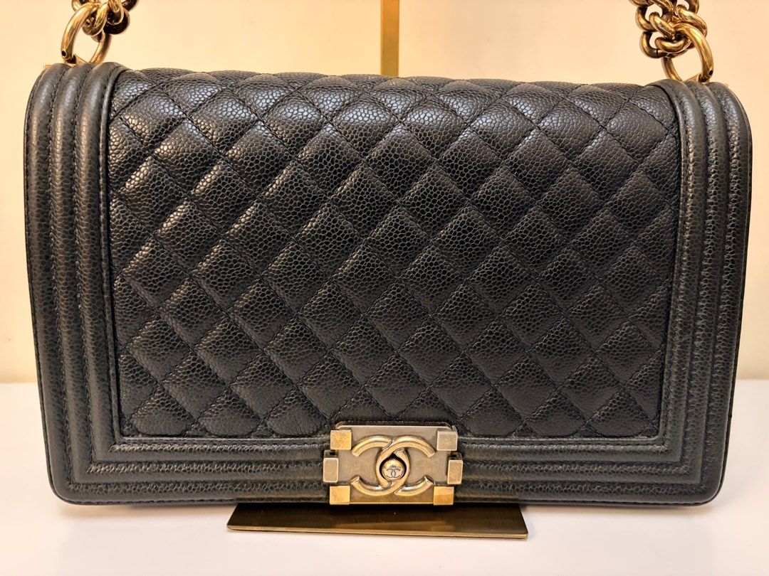 Authentic Chanel Caviar Navy Blue New Medium Leboy Flap Bag (Category: Luxury Bags & Wallets) located in Rizal. Submitted by SummerPeaCloset (Listing ID 1403028394, Image 1). Description: I’m selling my authentic Chanel Caviar Leboy Bag in new medium size. Color navy blue Selling for Php 179900 Specifications: - Brand: Chanel - Condition: Good - Material: Caviar Leather - Usage: Light Usage - Category: Bags - Inclusion: Original Brand Dustbag All